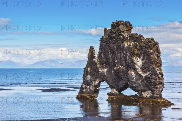 Ancient extinct volcano Hvitserkur on the sea shelf. Stone mammoth Iceland