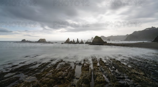 A long expiosure view of the Playa de Gueirua beach on the Costa Verde of Asturias