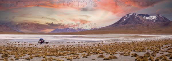 Amazing sky at sunset over Altiplano, Bolivia as an off-road vehicle is driving by