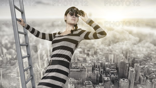 woman using a spyglass on top of a ladder