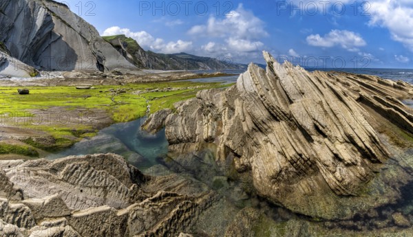 A view of the Flysch rock formations and cliffs with tidal pools on the Basque Country coast near Zumaia