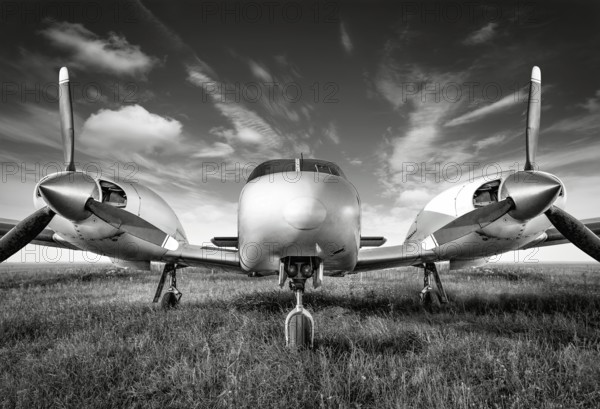 sports plane against a cloudy sky