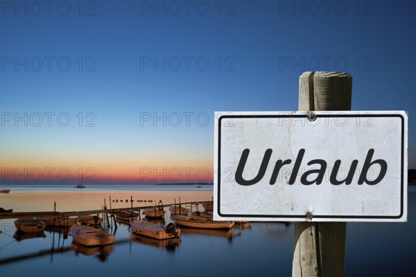 Sign with the inscription Urlaub an der K