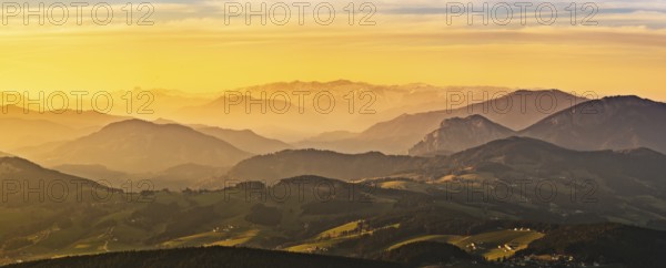 Panorama landscape view during sunset in spring from Graz Schockl mountain in Styria, Austria. Famous tourist destination, hiking and mountain biking spot