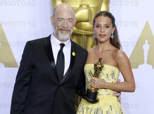 Alicia Vikander and J.K. Simmons at the 88th Annual Academy Awards, Press Room held at the Loews Hollywood Hotel in Hollywood, USA on February 28, 2016., Hollywood, California, USA, North America