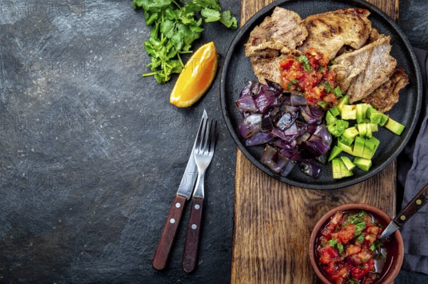 Food, Yucatan Mexican Food Pork POC CHUC poc chuck. Pork marinaded in orange juice served with avocado, purple onion and rustic tomato sauce