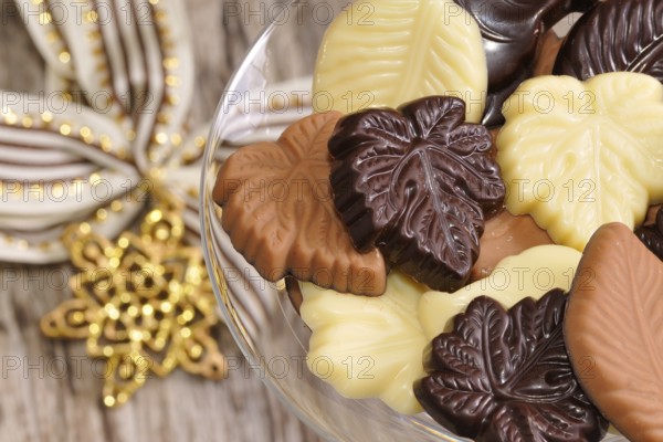 Chocolate leaves with decoration. Different types of chocolate