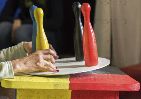Four colourful game cones are not balanced on a turntable - Germany