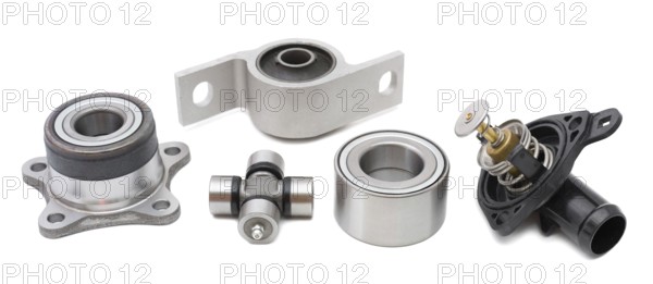 Some auto spare parts against white background