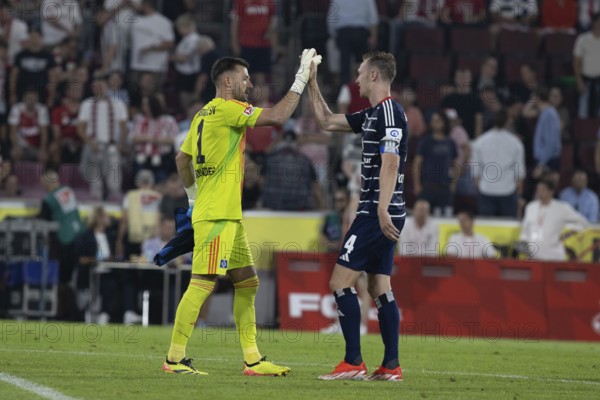Daniel Heuer Fernandes (Hamburger SV, Goalkeeper, #1), Sebastian Schonlau (Hamburger SV, Defence, #4), 2nd Bundesliga, 1. FC Köln, Hamburger SV on 02/08/2024 at the RheinEnergieStadion in Cologne Germany . (DFL/DFB REGULATIONS PROHIBIT ANY USE OF PHOTOGRAPHS AS IMAGE SEQUENCES AND/OR QUASI-VIDEO)
