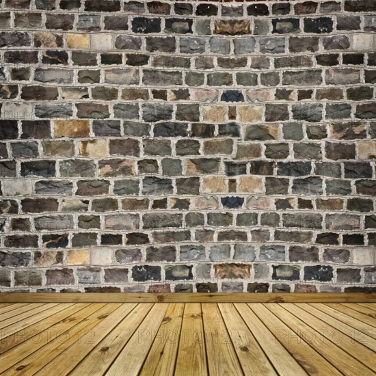 Coarse stone wall and the wooden floor