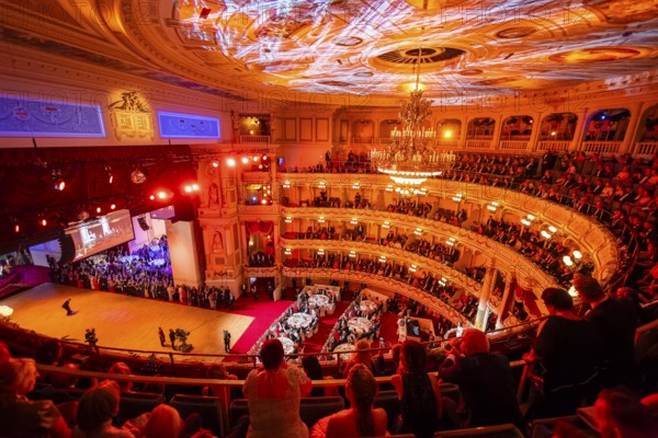 The SemperOperaball 2025 celebrated its 100th anniversary on Friday. Germany's most beautiful classical entertainment event once again proved to be a complete success this year and offered a first-class programme created by top artists. In keeping with tradition, thousands of Dresdeners celebrated the event of the year outside on the theatre square at the Semper Opera Ball. Festively decorated ballroom, Dresden, Saxony, Germany, Europe