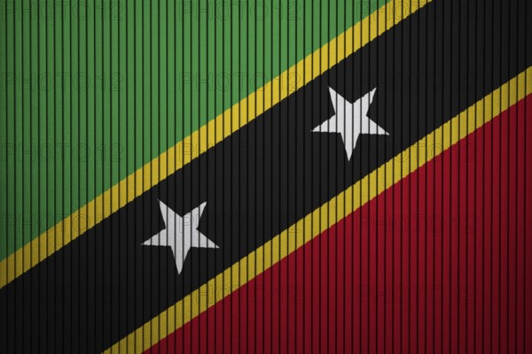 Saint Kitts and Nevis Flag painted on the cracked grunge concrete wall