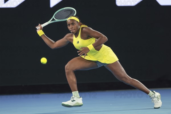 American tennis player Coco Gauff (USA) playing a forehand shot at the Australian Open 2025 tournament, Melbourne Park, Melbourne, Victoria, Australia, Oceania