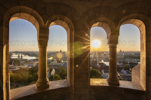 Old historic fortress and church at sunrise. City panorama at dusk. View of the Danube Fishermen's Bastion, Halászbástya, Budapest, Hungary, Europe