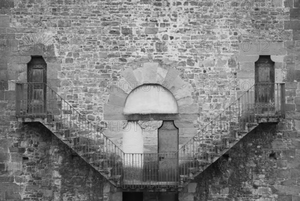 Exterior of antique building with Escher architecture style. Simmetry and geometric perspective