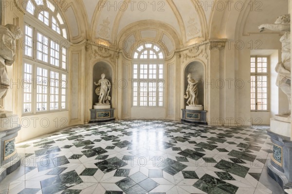 Venaria Reale, Italy, January 2023: luxury interior old royal palace. Gallery perspective with window, Europe