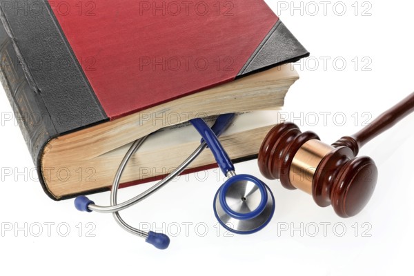 A blue stethoscope lies in a medical book Austria