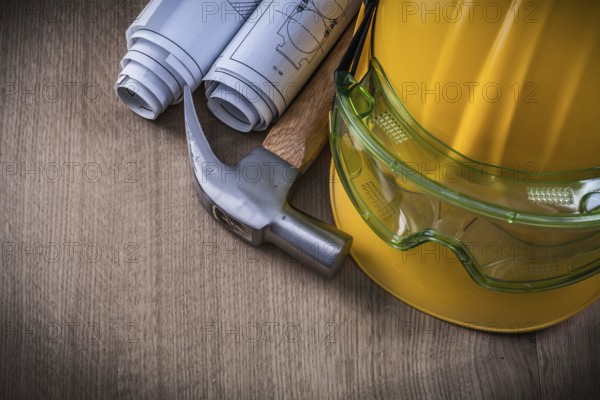 Claw hammer safety goggles construction drawings and hard hat