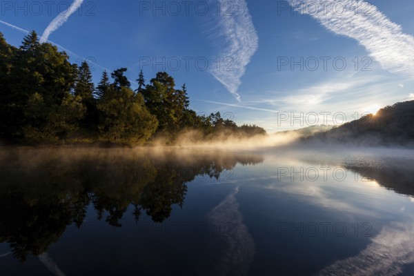 Lake with morning fog Light mood