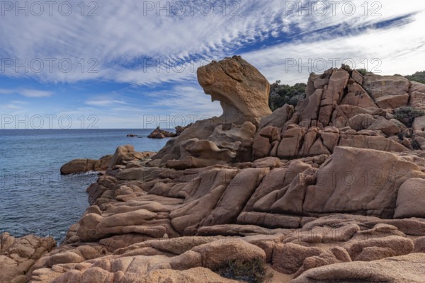 Coastal landscape with bizarre red rocks and sea view, Spiaggia di Cala E'Luas, Ogliastra, Sardinia, Italy, Europe