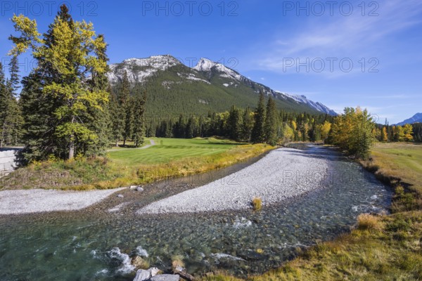 Autumn day in the Canadian Rockies. Dry creek in Banff National Park