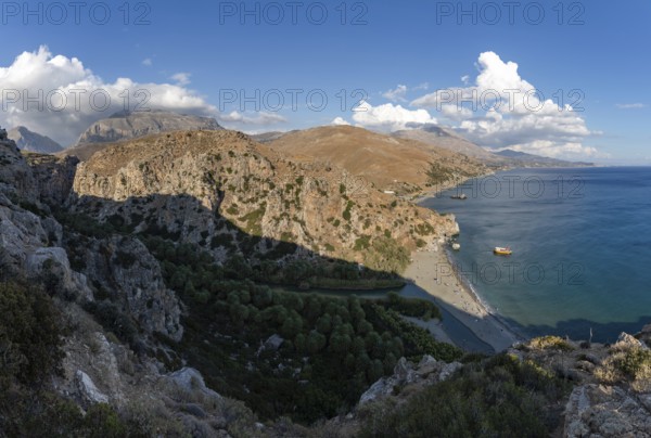 A picture of the Preveli Beach and the Preveli Palm Forest, as well as the nearby landscape and coast