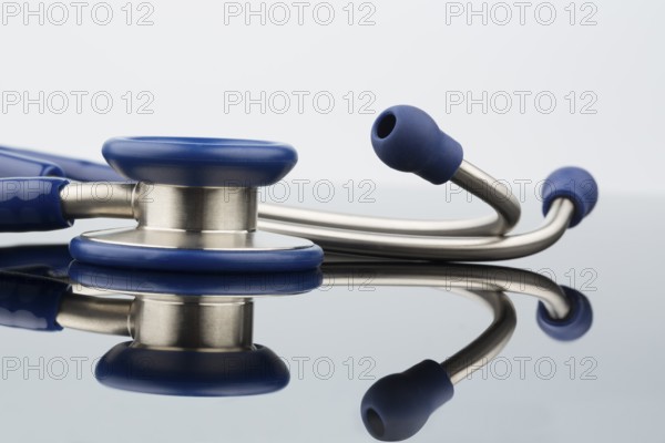 Stethoscope against a white background, symbolic photo for the medical profession and diagnostics