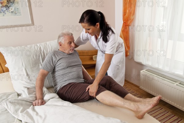 A carer caring for the elderly in a retirement home in Austria