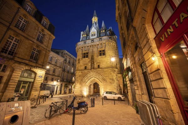 Bordeaux, France, April 17, 2023: Night view of the Porte Cailhau or Porte du Palais. The former town gate of the city of Bordeaux in France. One of the main touristic attractions of the French city. High quality photography, Europe