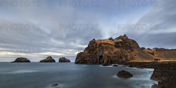 The coast and the ocean of Vestmannaeyjar island and the Elephant rock, Iceland, Europe