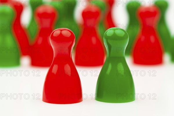 Red and green pawns. Coalition government between red and green. Austria