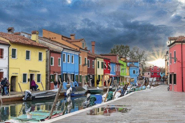 Colorful Houses in Burano beneath a scenic sky, Island of Venice, Italy, Europe