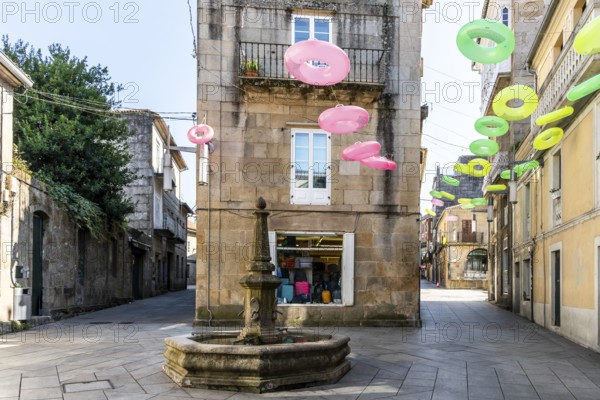 Beautiful View of Residential Building with decorative elements hanging above - Pontevedra, Spain, Europe