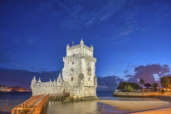 Lisbon Portugal, night city skyline at Belem Tower