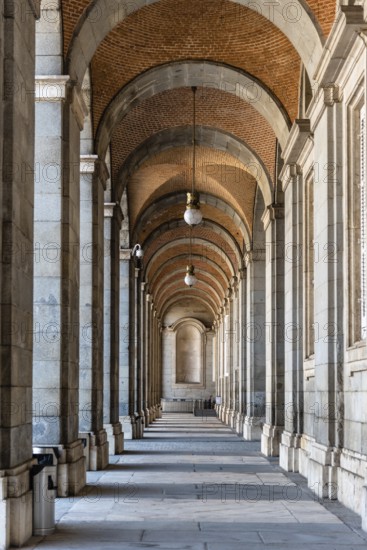 Madrid, Spain, November 1, 2020: Arcade in the Royal Palace of Madrid. Plaza de la Armeria, Europe