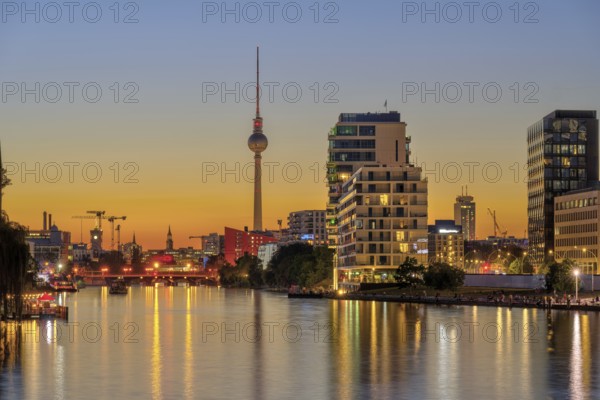 The Spree in Berlin after sunset with the famous television tower in the background