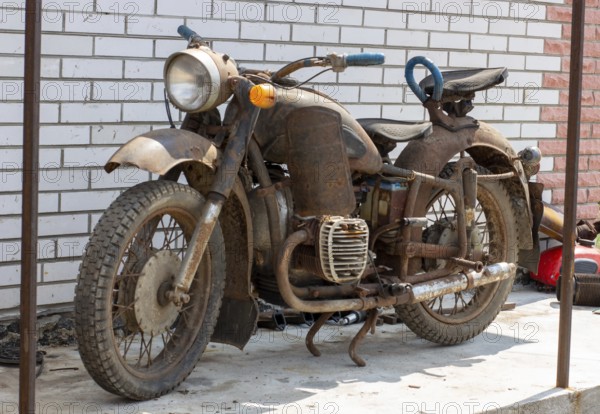 Old rusty retro motorcycle. Bike for restoration