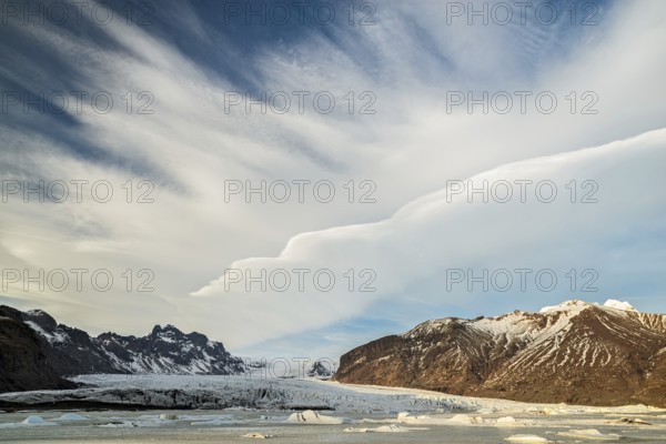 Cloud formation over Skaftafell glacier in Vatnajokull National Park, Iceland, Europe