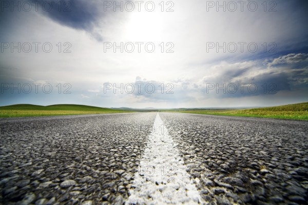 High speed road with cloudy sky background