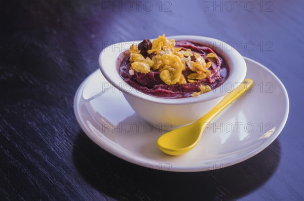 Acai bowl with granola. Typical Brazilian food