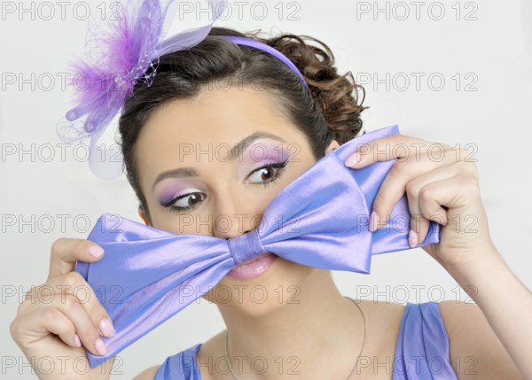 Beautiful women in evening dresses have fun studio shooting