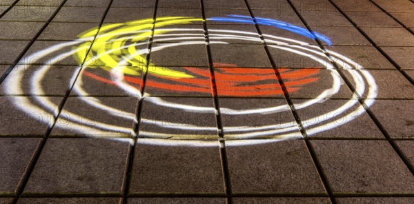 Taebeck, South Korea. January 29, 2019: Night view of circles of yellow, blue, orange and white on sidewalk