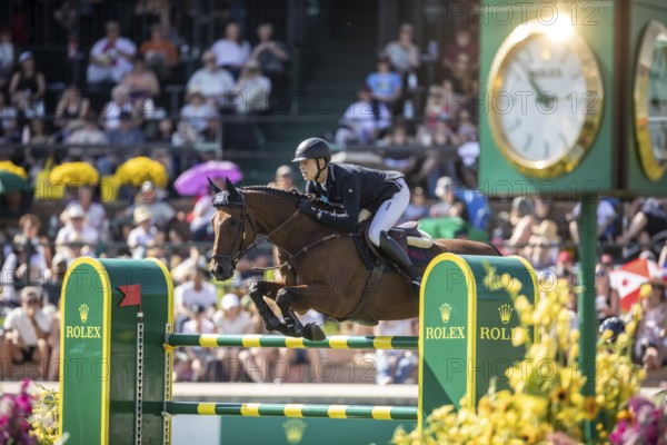 Max Kuhner of Austria riding Elektric Blue P compete in the first round of the 1.60m CPKC International during the Spruce Meadows Masters, presented by Rolex, in Calgary, Alberta, Canada, North America
