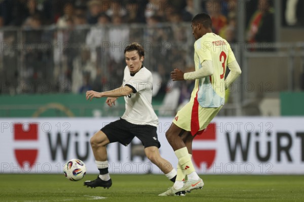Football, U21, Friendly match, 2024/2025, Germany U21 vs. Spain U21, 25.03.2025, Merck-Stadion am Böllenfalltor, Darmstadt, Germany, Rocco REITZ (Germany U21, 18) in duel with Cristhian MOSQUERA Spain U21, Europe