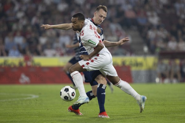 Sebastian Schonlau (Hamburger SV, defence, #4), Linton Maina (1.FC Köln, midfield, #37), 2nd Bundesliga, 1. FC Köln, Hamburger SV on 02/08/2024 at the RheinEnergieStadion in Cologne Germany . (DFL/DFB REGULATIONS PROHIBIT ANY USE OF PHOTOGRAPHS AS IMAGE SEQUENCES AND/OR QUASI-VIDEO)