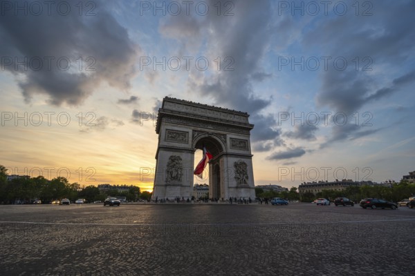 Paris France, city skyline sunset at Arc de Triomphe and Champs Elysees