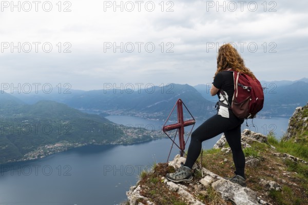 Trekking scene on Lake Como alps in spring