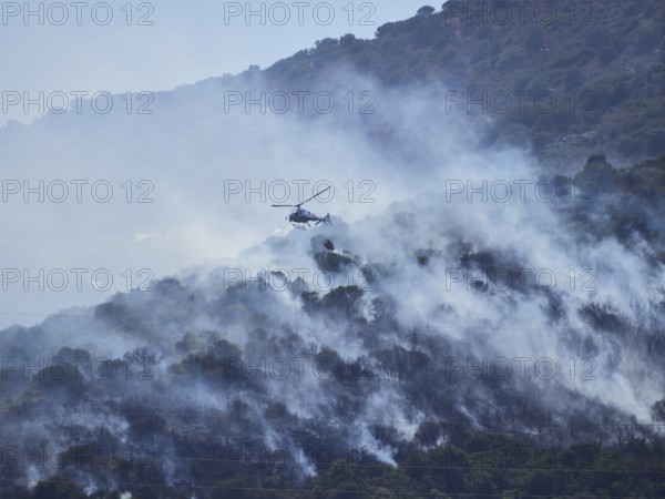 A picture of fire fighters in the sky