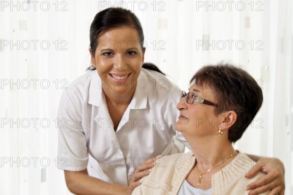 A carer caring for the elderly in a retirement home in Austria